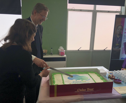 Project SEARCH 3   David Forbes Nixon cutting cake with Janet Wingate Whyte